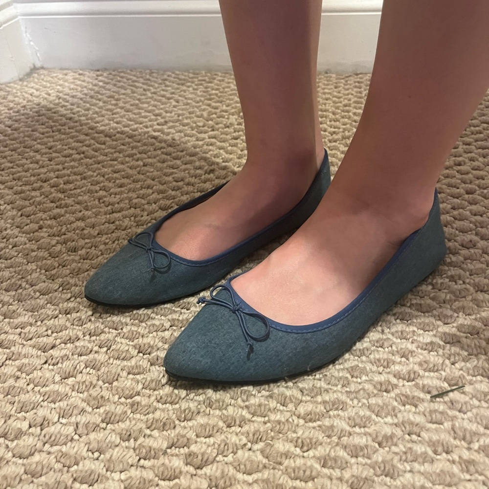 blue pointy ballet flats with tiny bow detailing